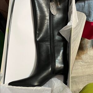 Sleek Black Leather Heeled Boots